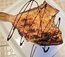 Рыба камбала на углях