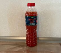 Տոմատի հյութ կծու Champion