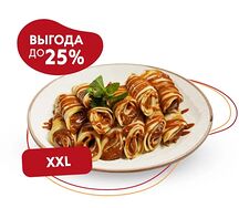 Большая порция блинчиков со сгущенкой