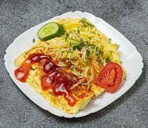 Отбивная из курицы с гарниром