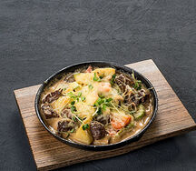 Томленые кусочки говядины с сезонными овощами