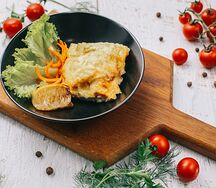 Рыба под овощами