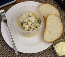 Треска в соусе бешамель