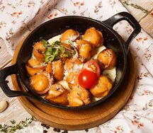 Пельмени жареные в сливочном соусе