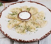 Вареники с квашеной капустой и шкварками