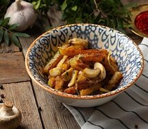 Картофель, жаренный с шампиньонами