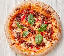 С томленной говядиной и шпинатом