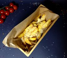 Картофельные дольки с пармезаном и трюфельным маслом