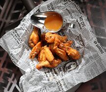 Куриные крылья в кисло-сладком соусе