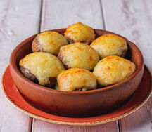 Грибные шапочки, фаршированные сыром сулугуни