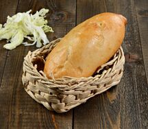 Печеный пирожок с капустой
