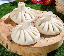 Хинкали с сыром сулугуни и тархуном