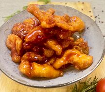 Хрустящая свинина гобажоу в кисло-сладком соусе