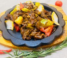 Утка на горячей сковородке