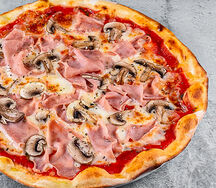 Пицца с ветчиной и грибами