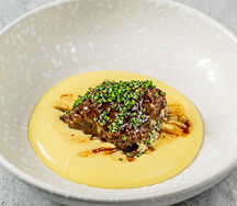 Томленые щечки с полентой