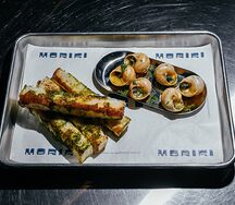 Улитки в бургундском соусе