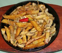 Картофель, жаренный с грибами