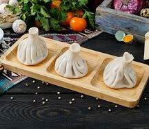 Хинкали с говядиной и зеленью