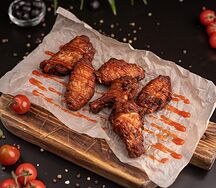 Куриные крылья под острым соусом
