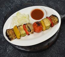 Овощи на мангале с фирменным соусом