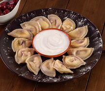 Вареники с творогом и сливочным маслом
