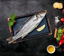 Сибас с овощами на пару
