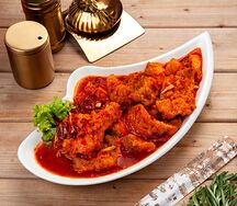 Кусочки рыбы в остром соусе
