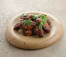 Запеченные куриные крылья в фирменном маринаде