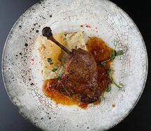 Утиная ножка с картофельным гратеном