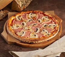 Пицца с ветчиной и грибами