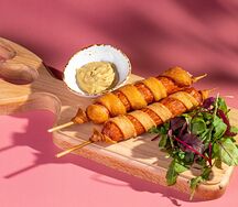 Сосиска на палочке с картошкой эскимо