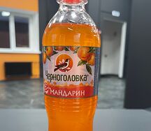 Черноголовка с мандарином