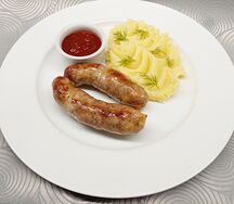 Колбаски свиные с соусом сацебели