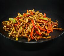 Կծու խոզի միս քնջութով