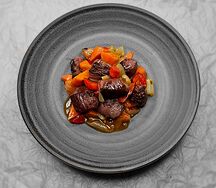 Говядина томленая с овощами