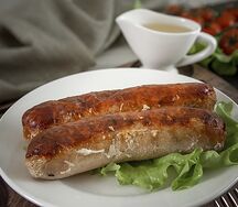 Колбаски жареные