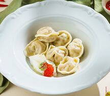 Пельмени из форели и капусты