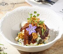 Оливье с говядиной и языком