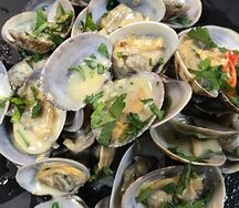 Вонголе в соусе дорблю