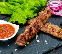 Люля из говядины с красным соусом