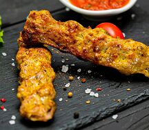 Люля из свинины с красным соусом