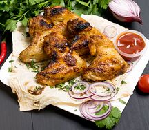 Шашлык на мангале из куриных крыльев