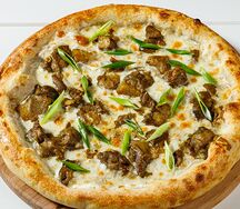 Пицца с белыми грибами