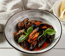 Мидии в томатном соусе