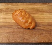 Пирожок печеный с зеленым луком и яйцом