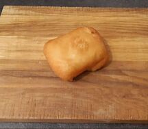 Пирожок печеный с картофелем и грибами