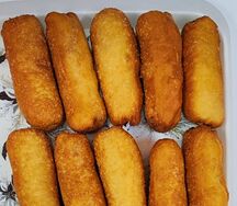 Сосиска в тесте жареная