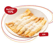 Большая порция блинов с сыром и ветчиной