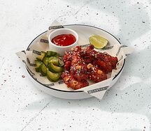 Куриные крылья с соусом Острый кочудян